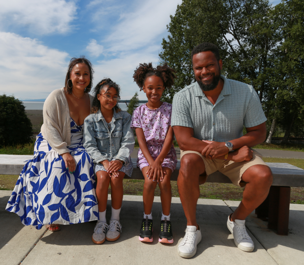 Aaron Sharp with his wife Ariane and daughters Dani and Millie in Anchorage, Alaska.