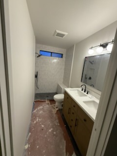 Fully finished modern bathroom remodel with double-sink vanity, custom mirror, lighting, and shower