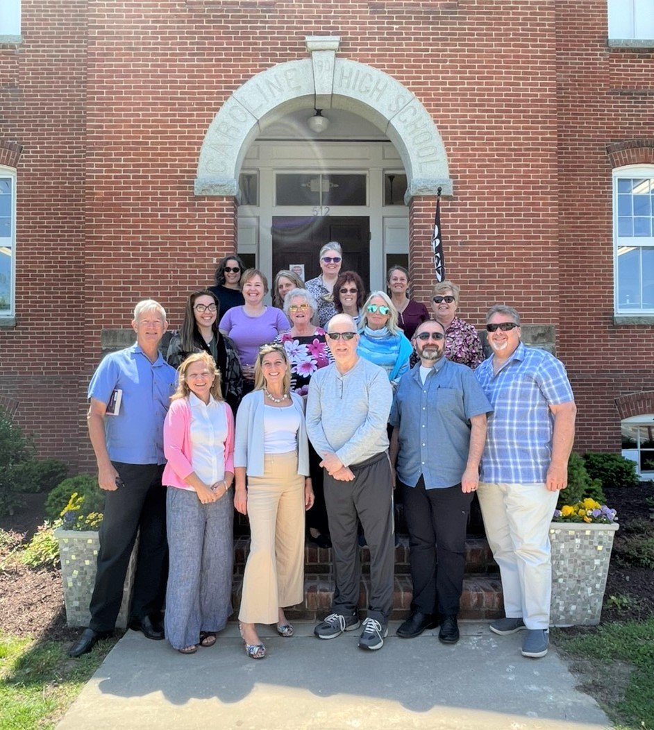 A group gathered outside Caroline High School for a CASA of Caroline volunteer appreciation luncheon.
