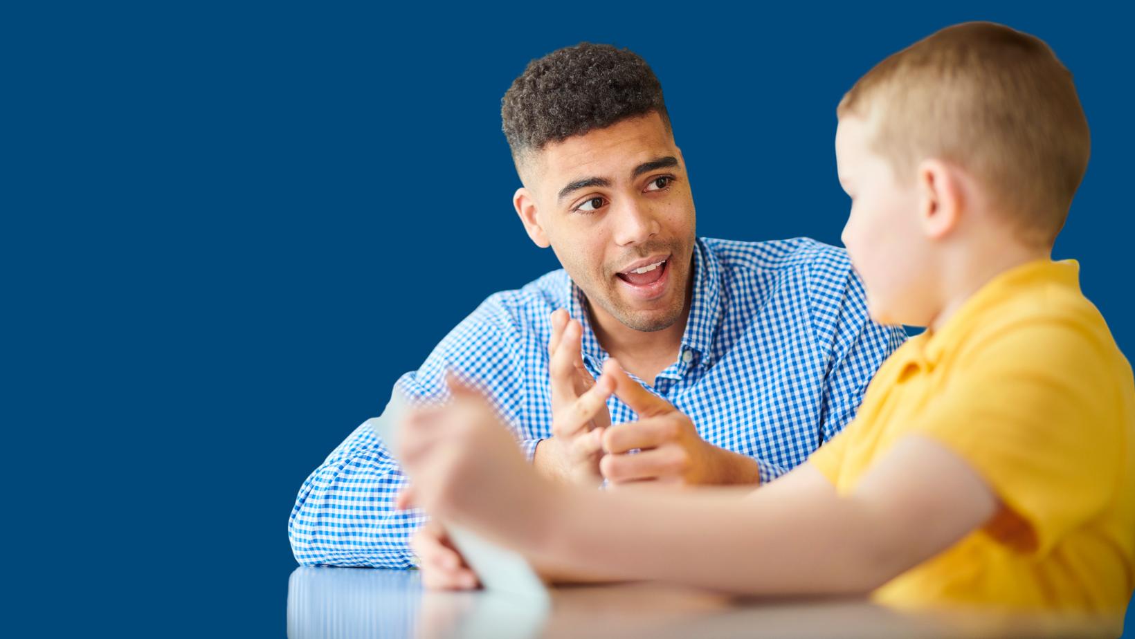 An adult and child talking together.