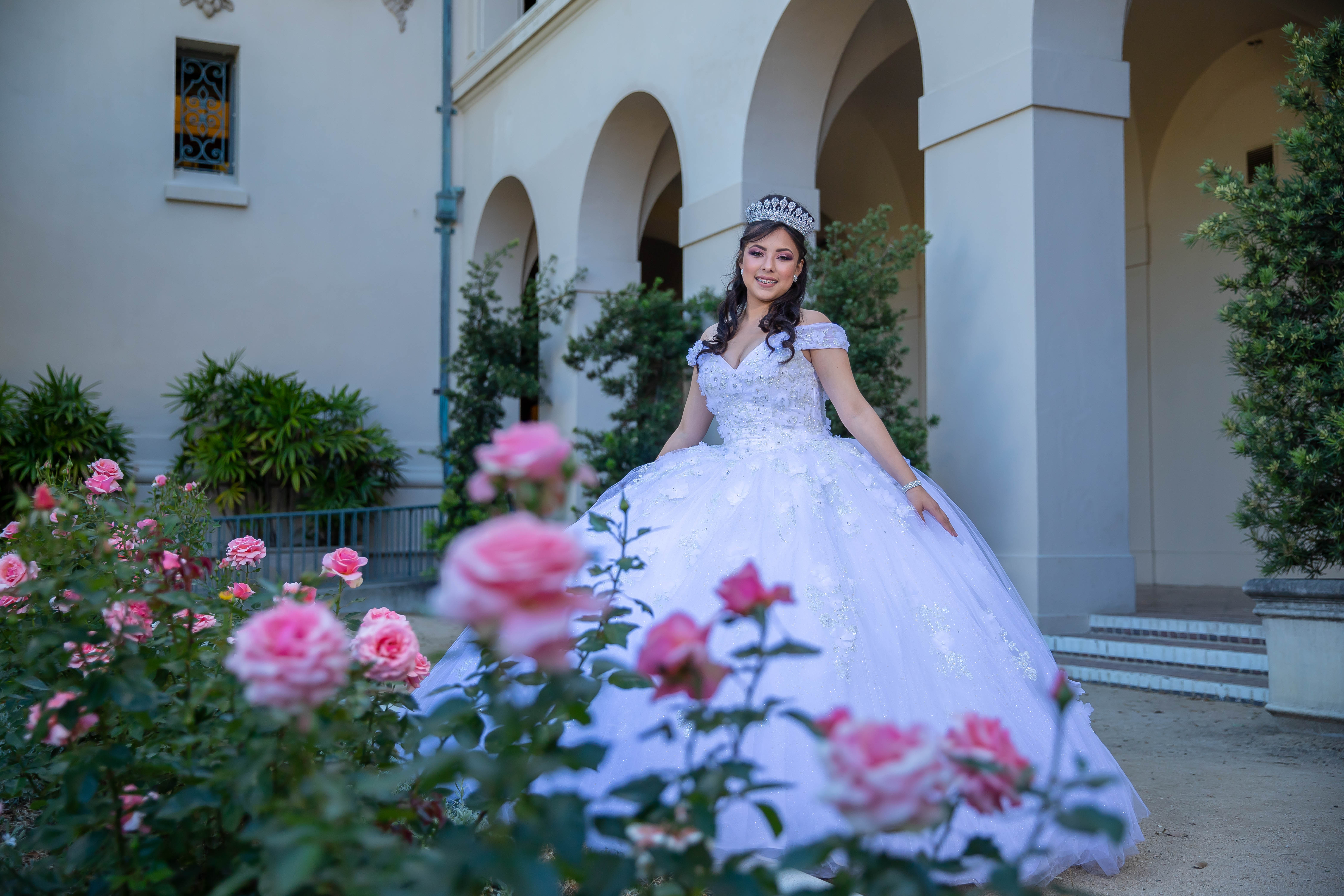 Elegant White Gown & Tiara in Rose Garden Courtyard