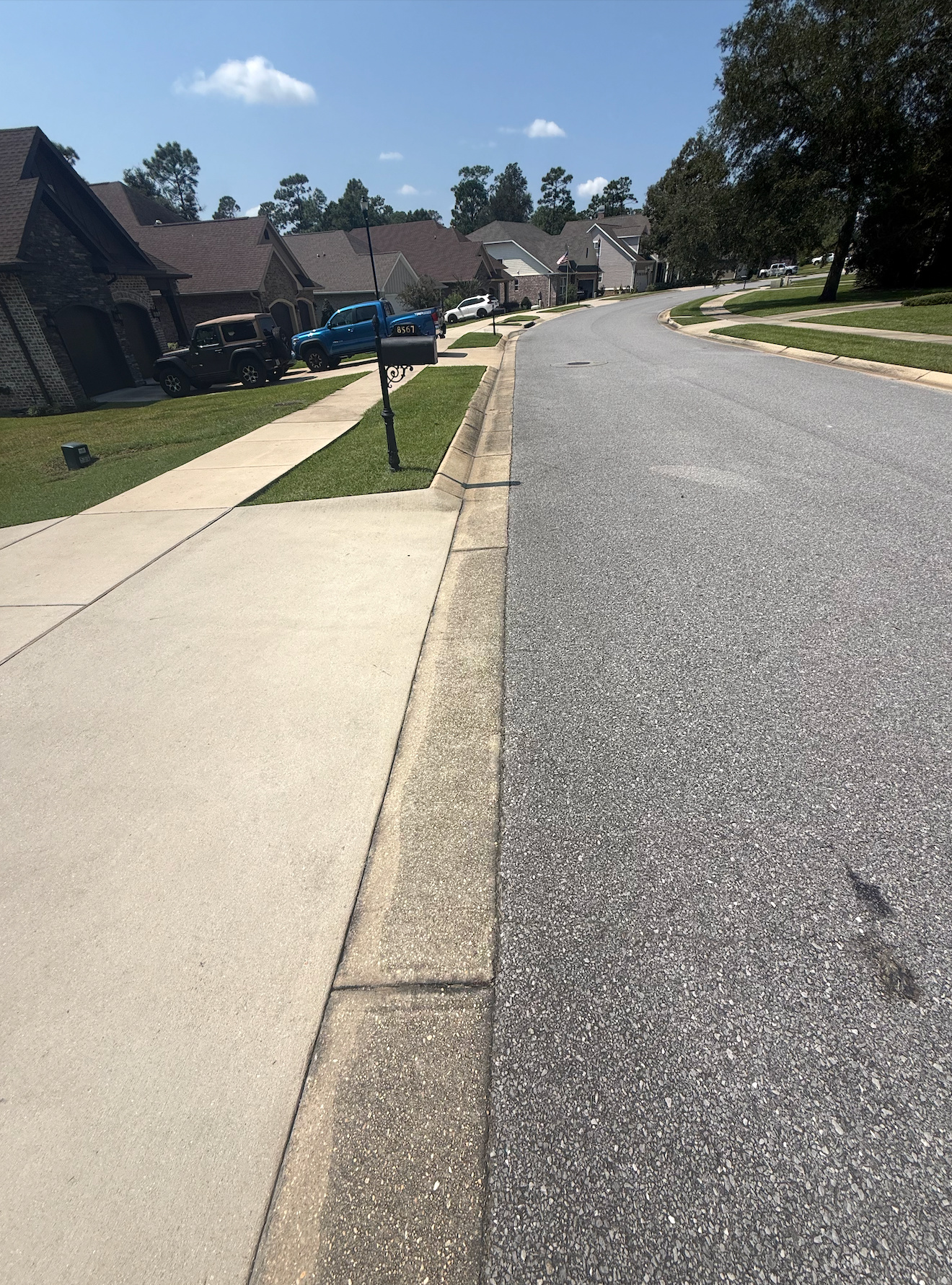 Residential Concrete Driveway Restoration after pressure washing by Panhandle Precision Pressure