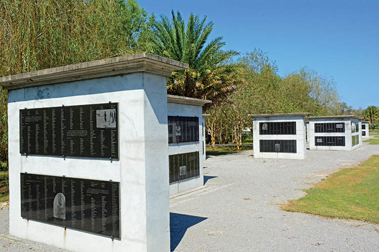 Granite memorial walls listing names of enslaved people at Whitney Plantation memorial