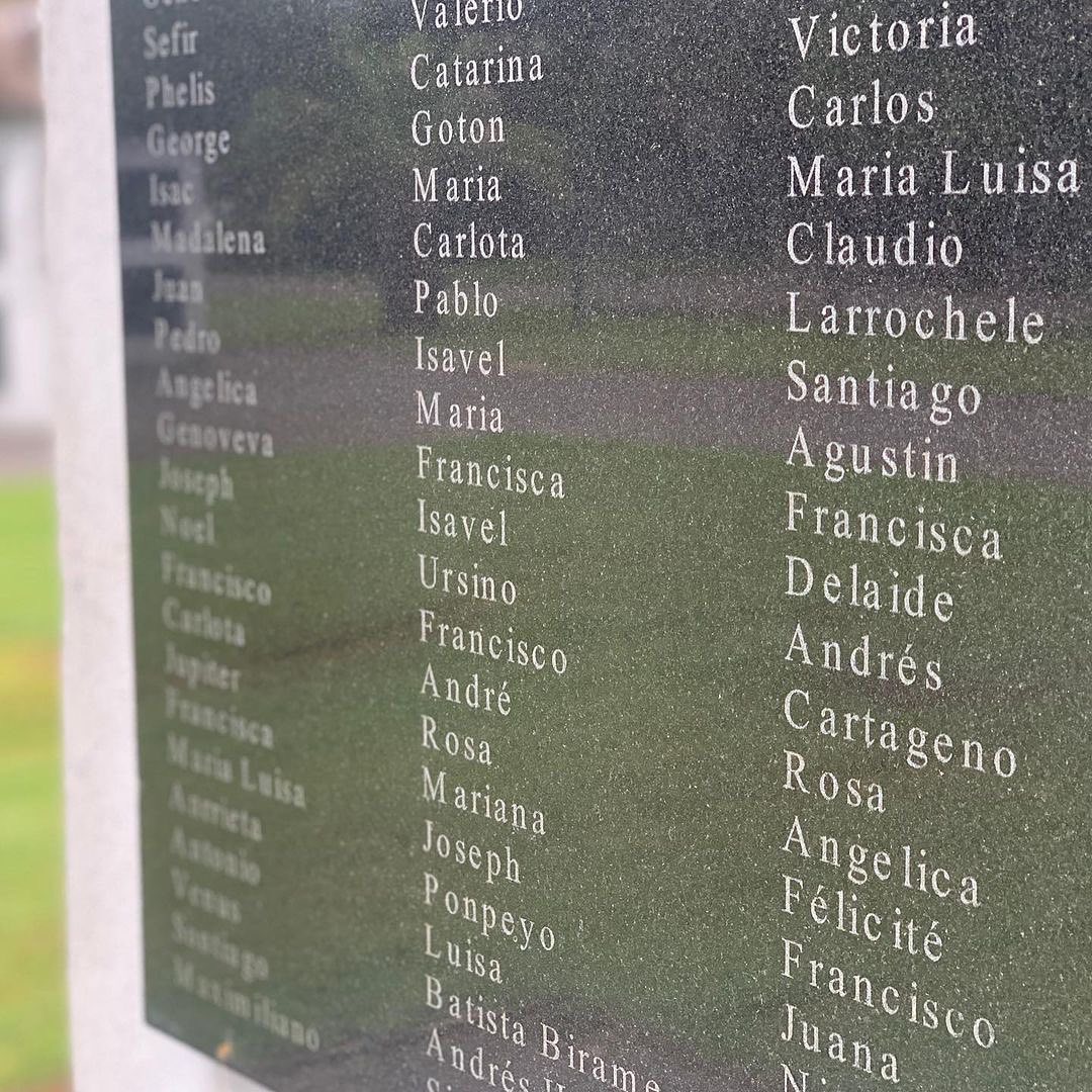 Black granite memorial wall engraved with names of enslaved persons at Whitney Plantation