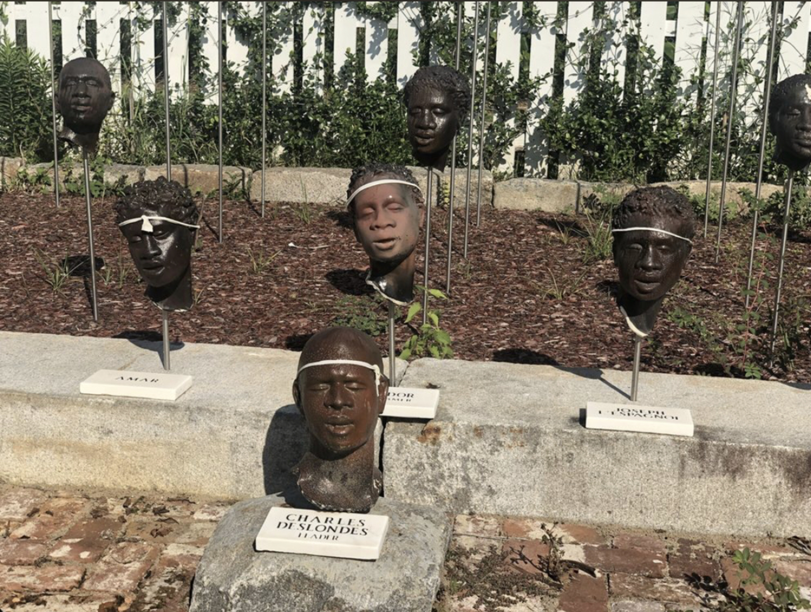 1811 German Coast Uprising memorial sculpted heads honoring Charles Deslondes and leaders at Whitney Plantation
