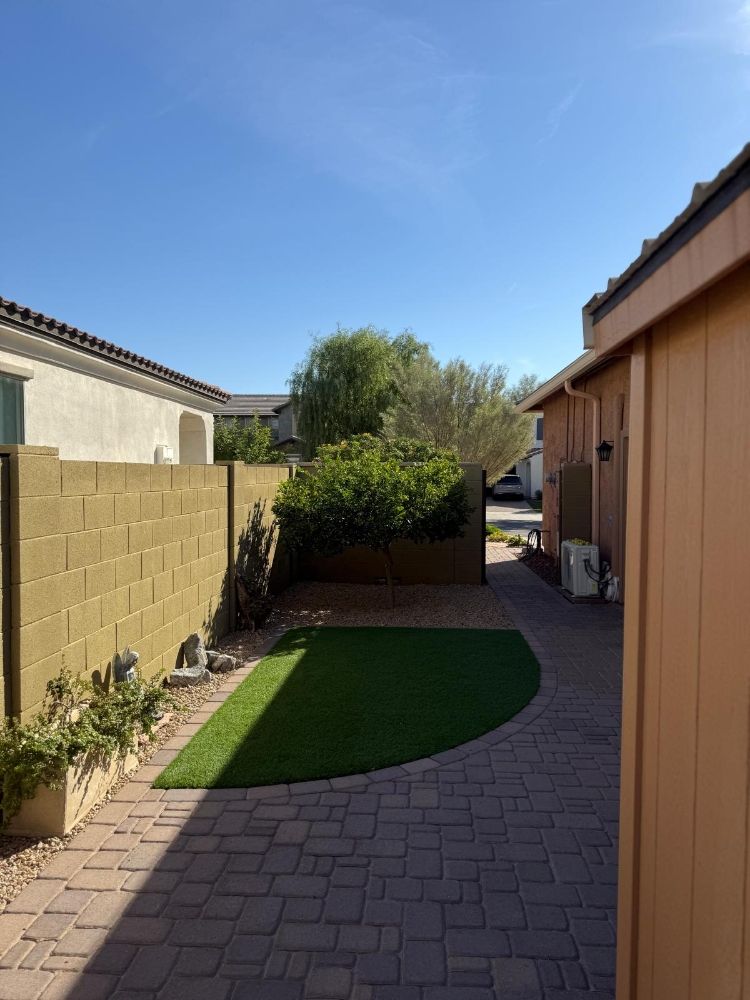 Side yard paver walkway and artificial turf installation