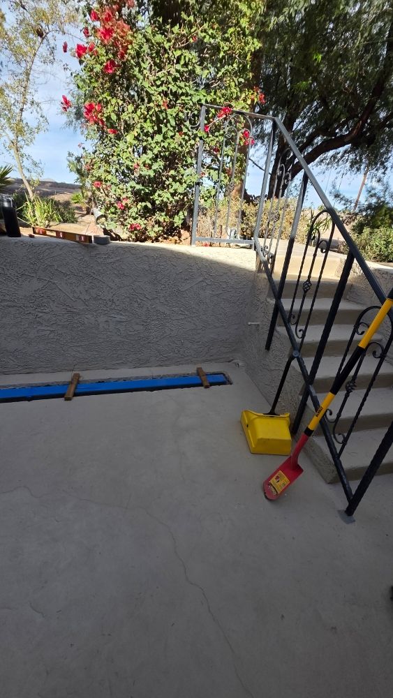 Progress: Concrete patio and step renovation work in progress