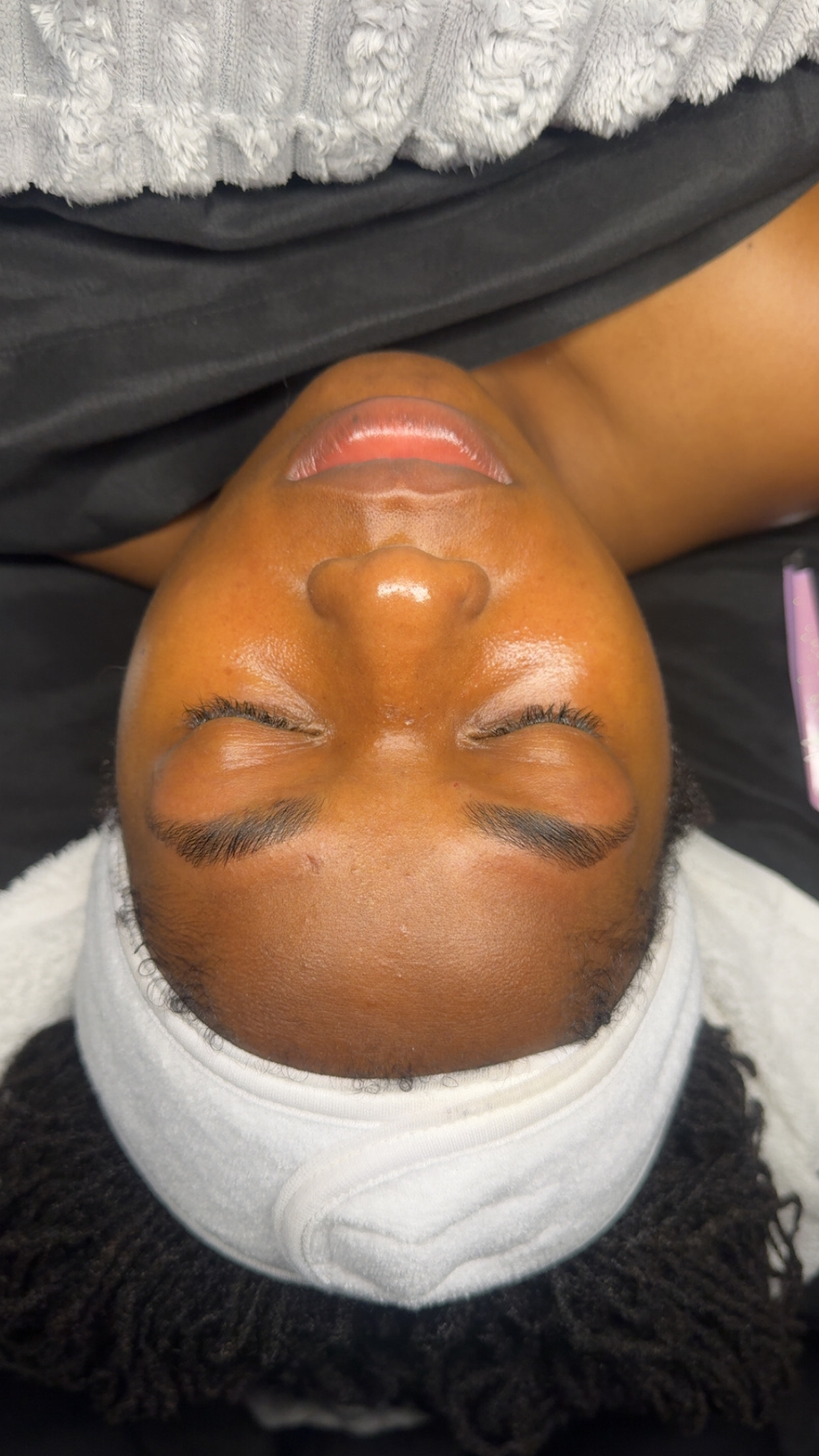 Guest receiving a peaceful massage treatment at Peace Oasis Spa
