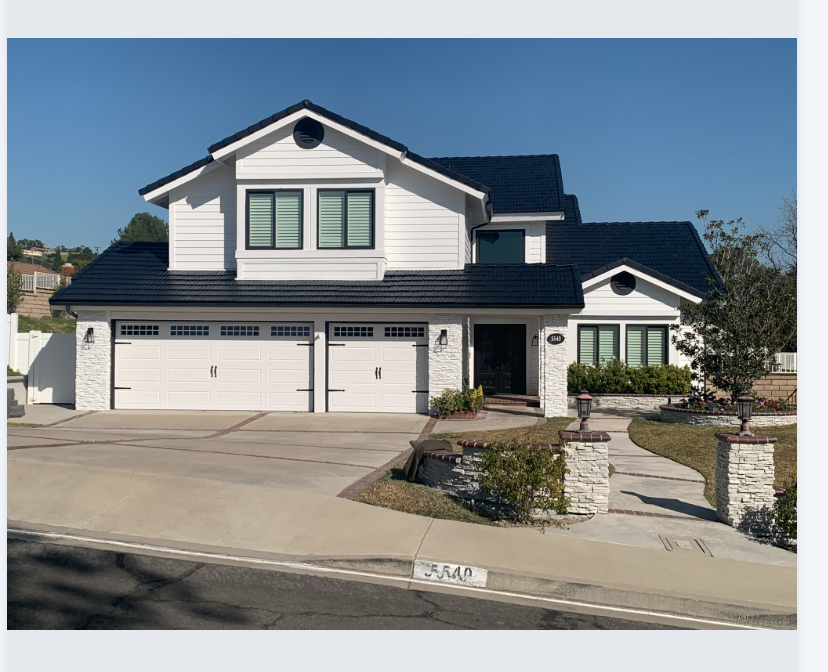 Two-Story Contemporary White Exterior & Black Accents