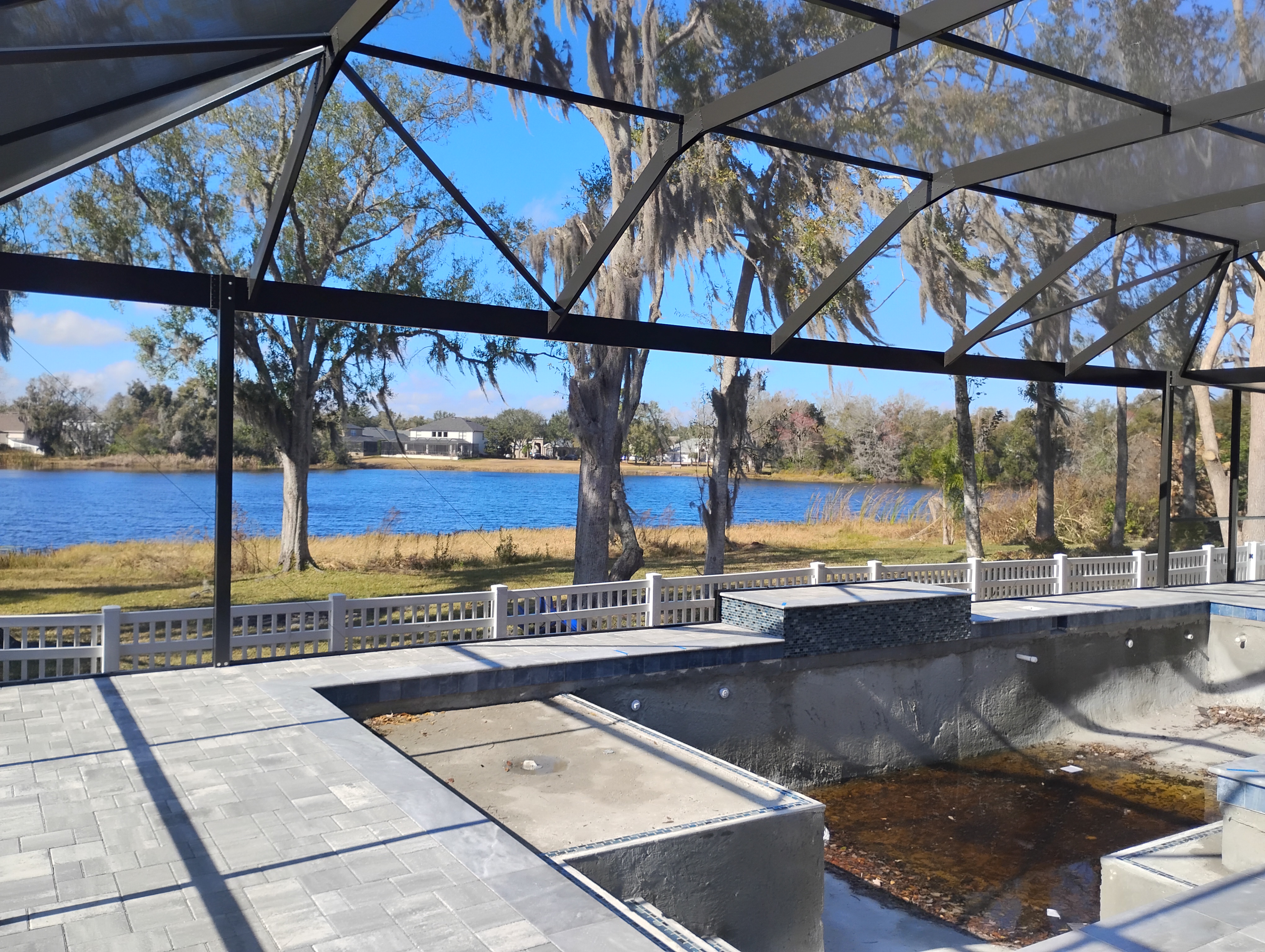 Pool cage enclosure installed in Lutz, FL by Screen Boss