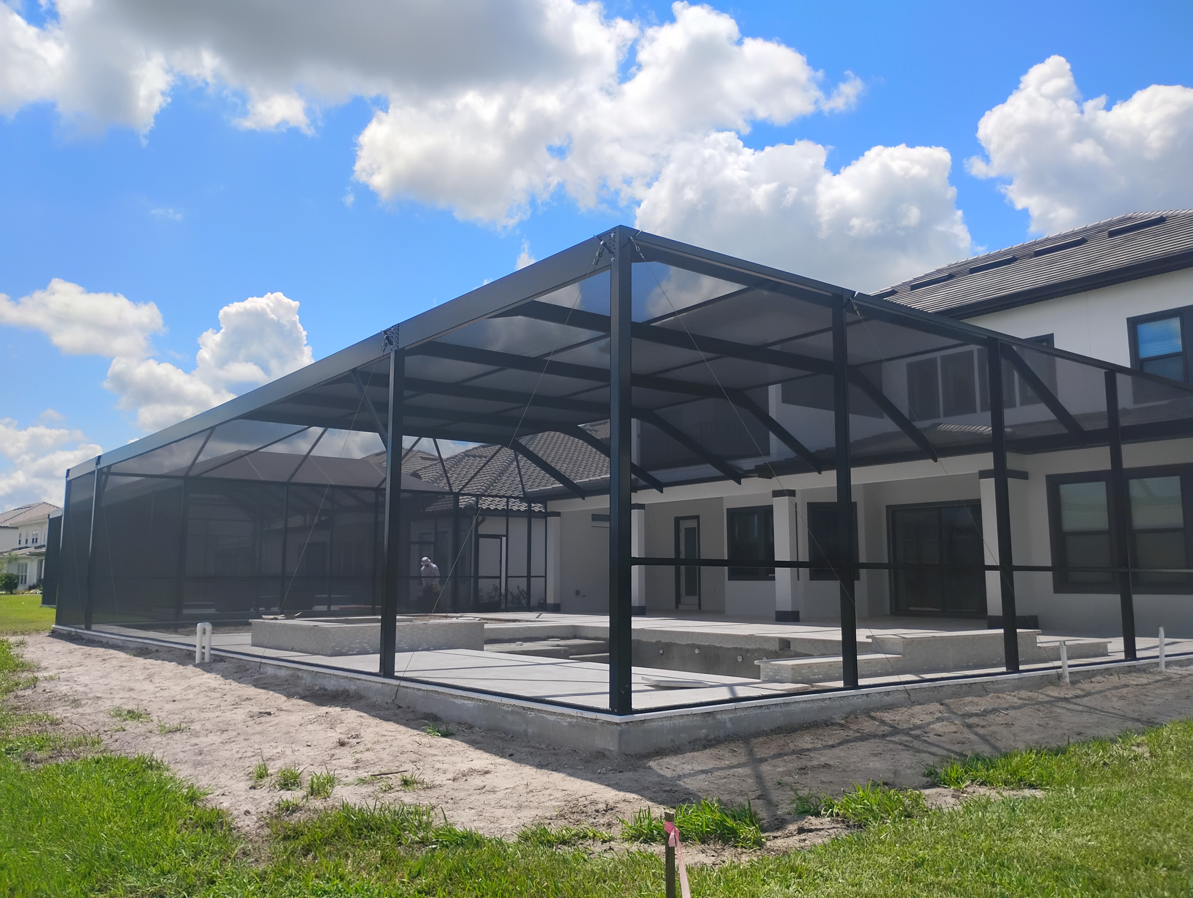 Pool cage enclosure installed in Wesley Chapel, FL by Screen Boss