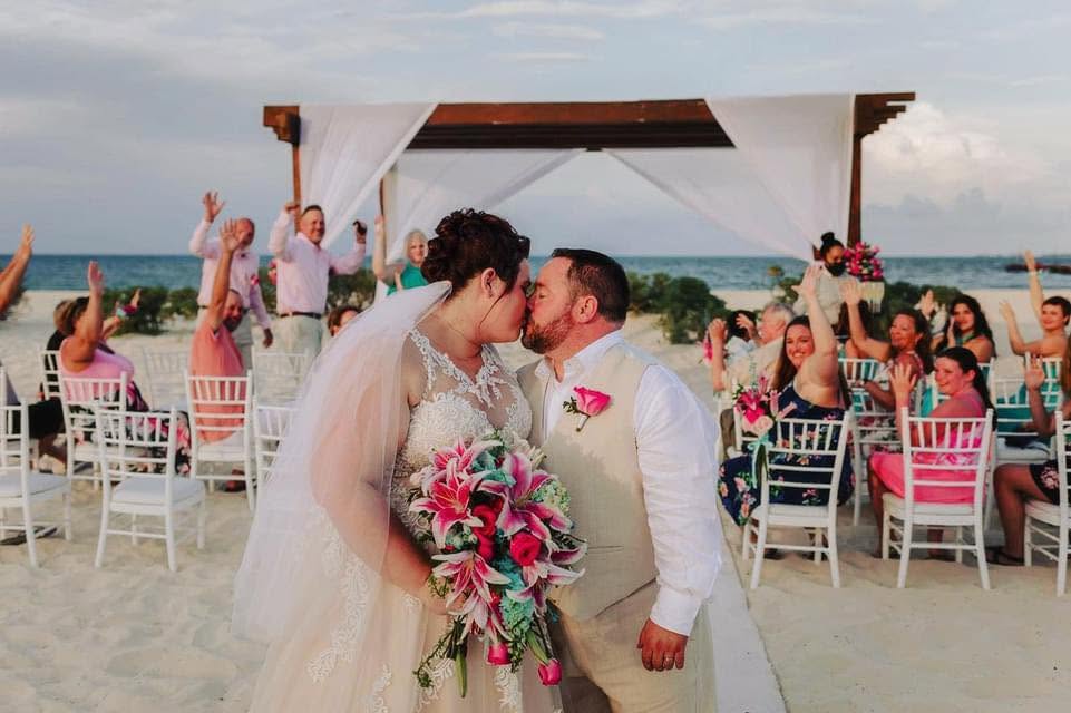 The Altar Kiss & Cheering Guests