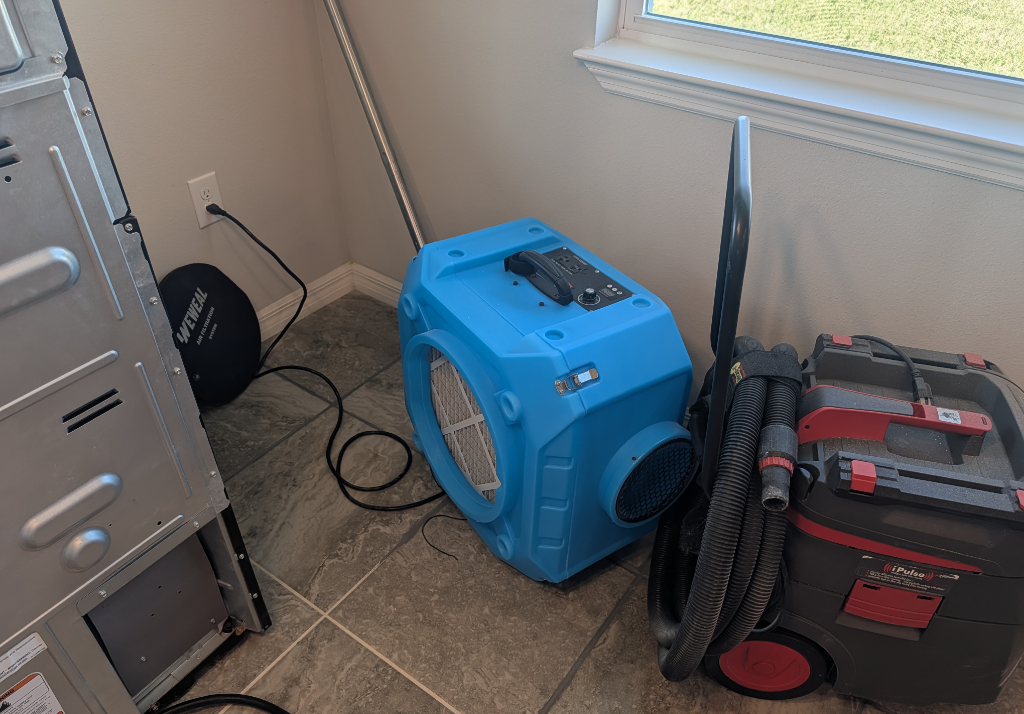 Professional mold remediation equipment used by JLX Environmental, including HEPA air scrubber and HEPA vacuum