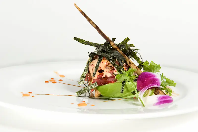 Spicy tuna tartare with avocado, nori, and citrus ponzu at Asian Bistro