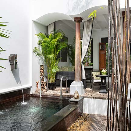The Siam Hotel Bill Bensley art deco courtyard garden Bangkok — photo 3