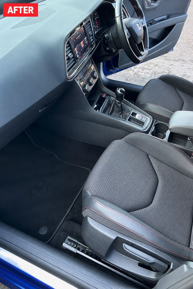 Clean detailed interior cabin with refreshed front seats and pristine console after mobile detailing