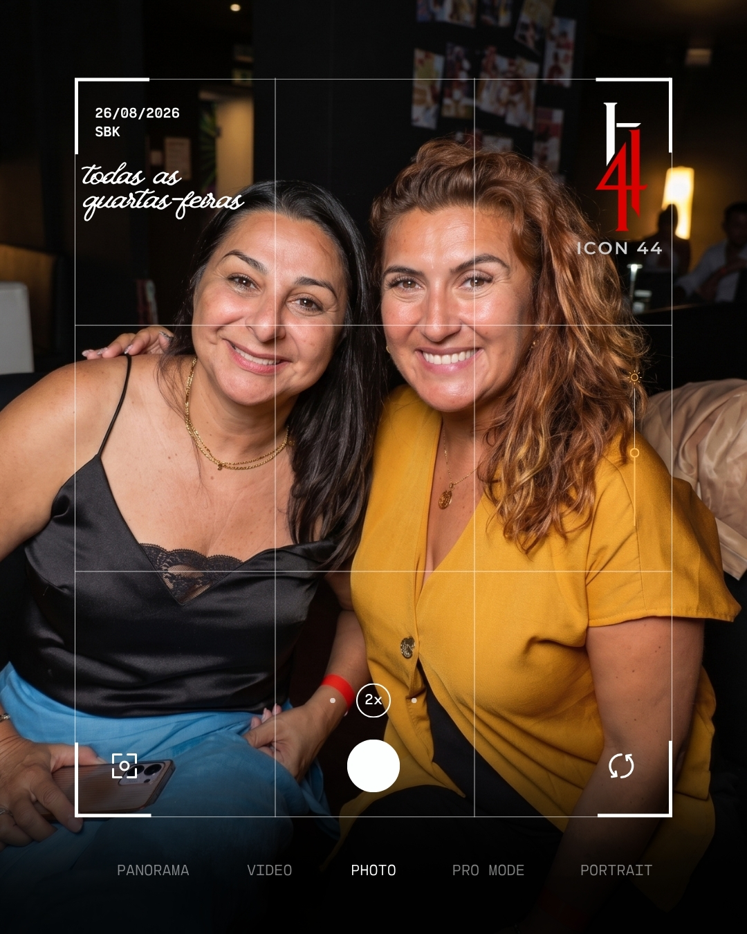 Friends smiling together at ICON44 sports bar and burger house