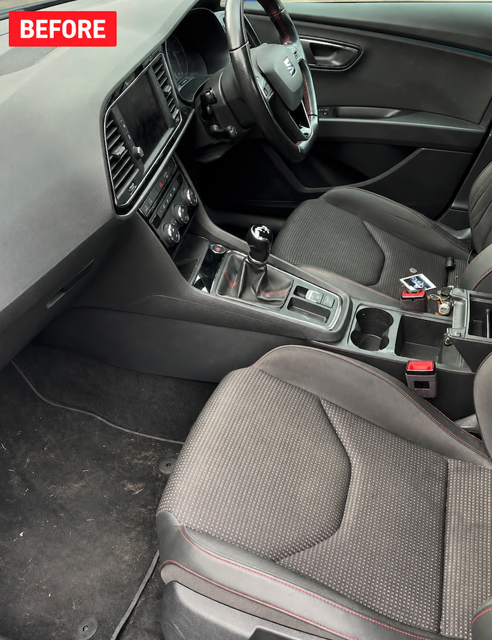 Soiled car interior cabin and center console before mobile detailing in Savannah