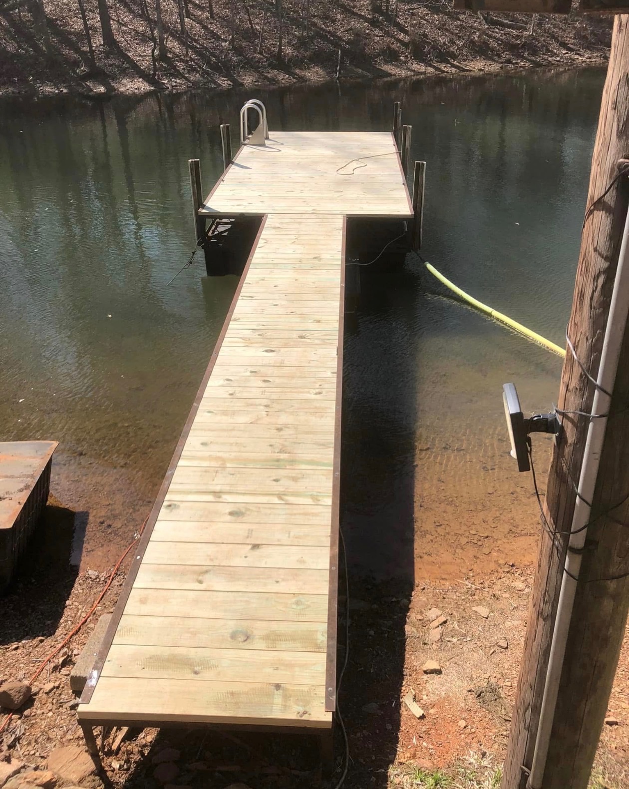 Finished dock decking replacement by Limitless Construction Services