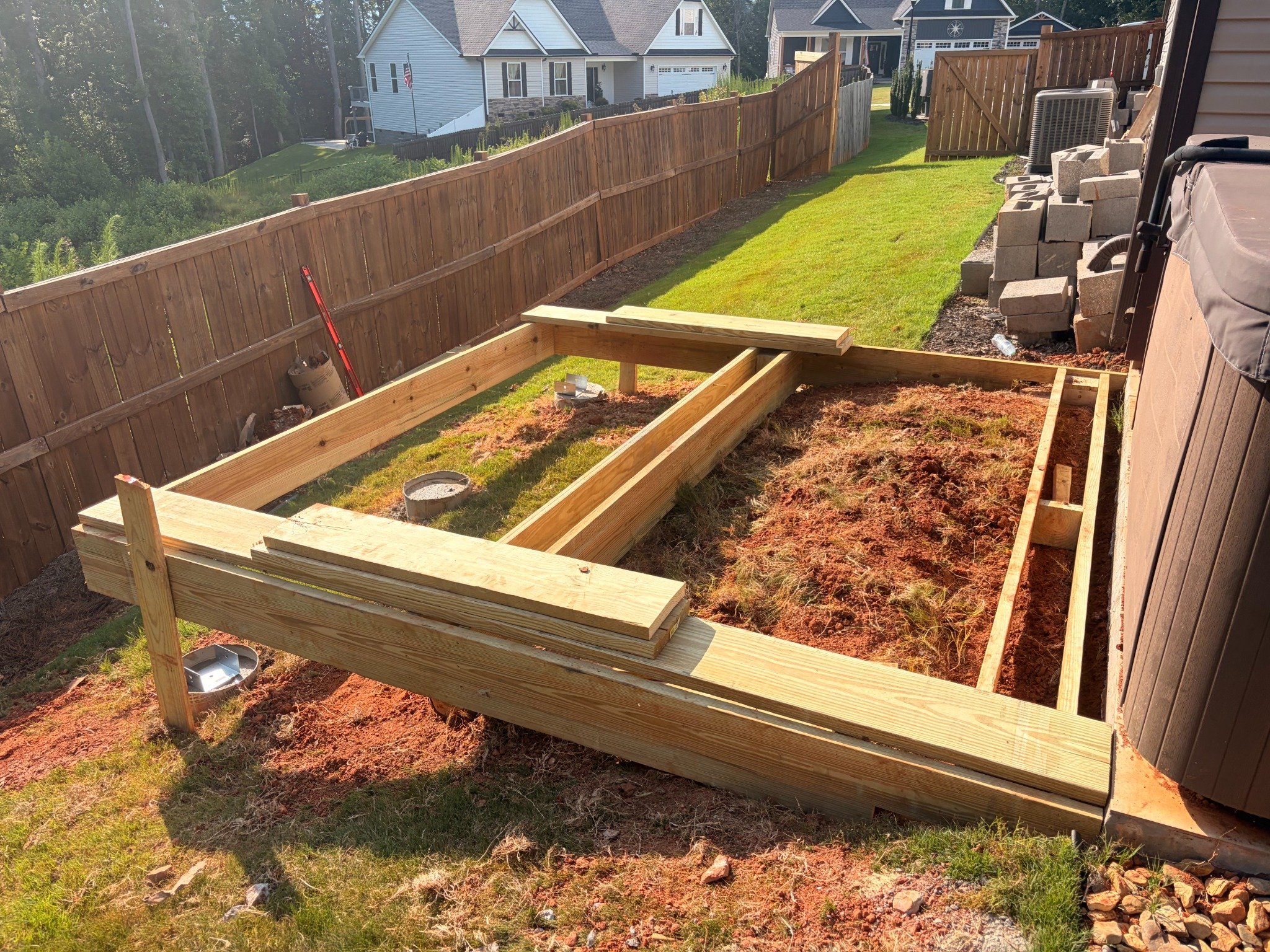 Hot Tub Deck joist and post framing in progress by Limitless Construction Services