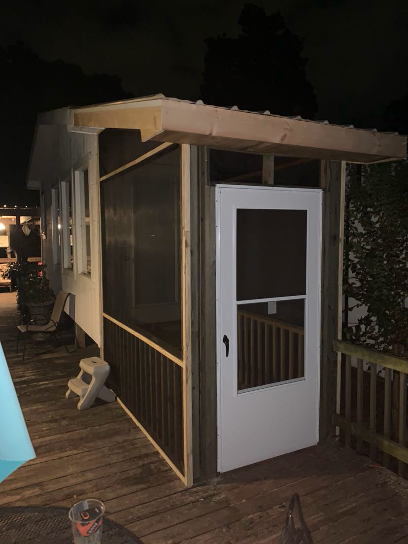Screened porch and deck enclosure build by Limitless Construction Services