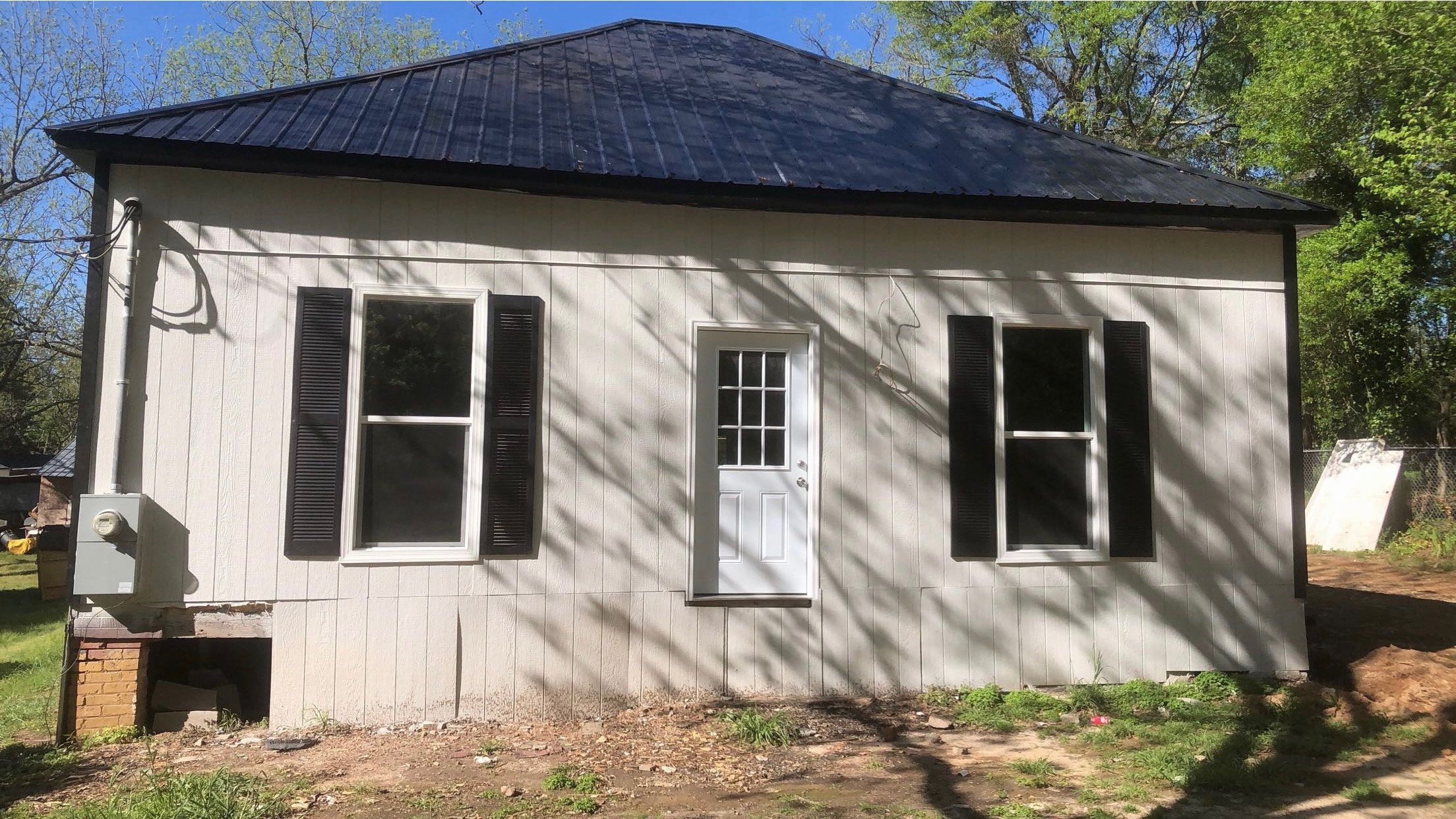 House exterior prior to porch deck build by Limitless Construction Services