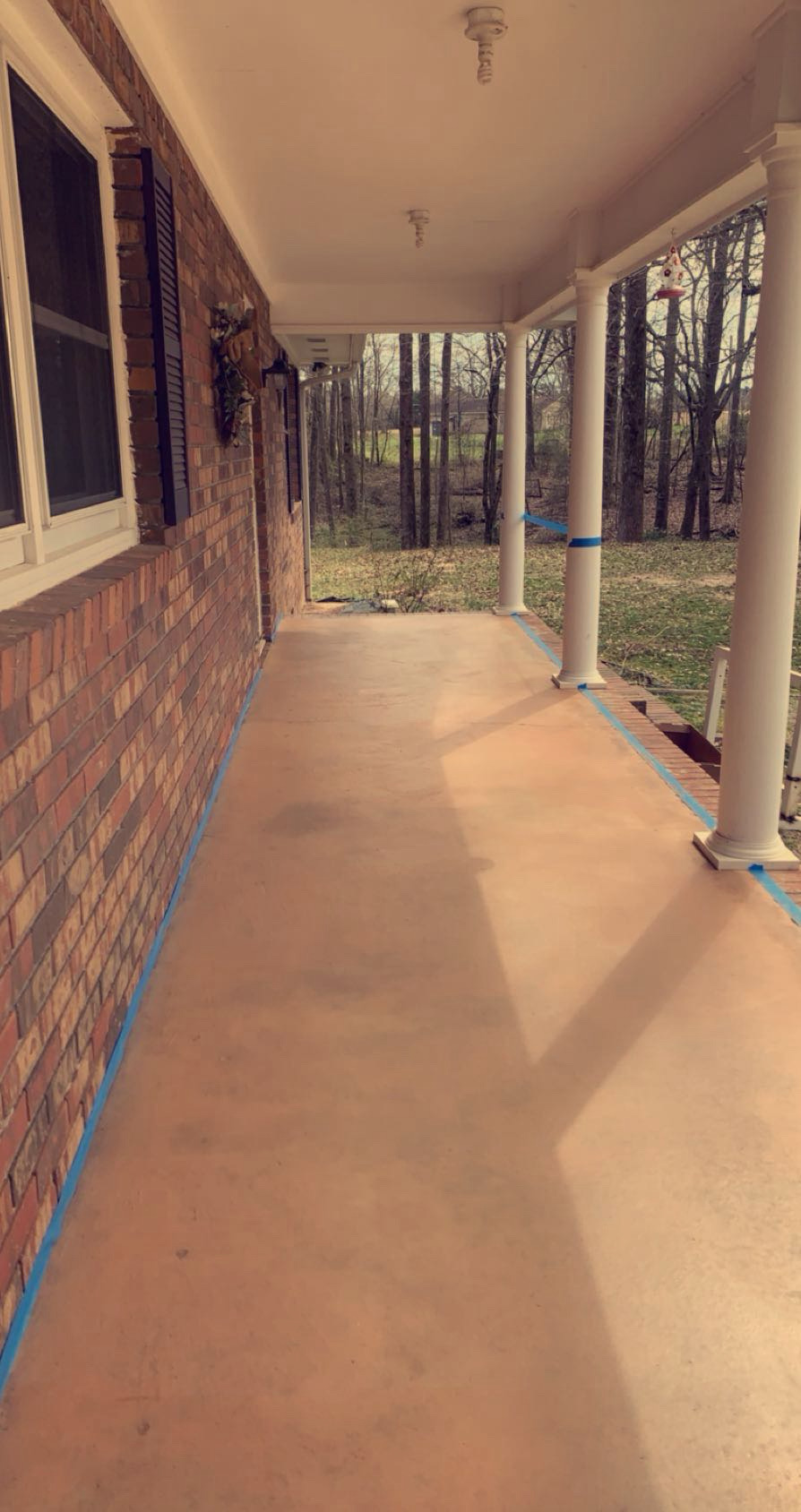 Completed concrete porch surface upgrade by Limitless Construction Services