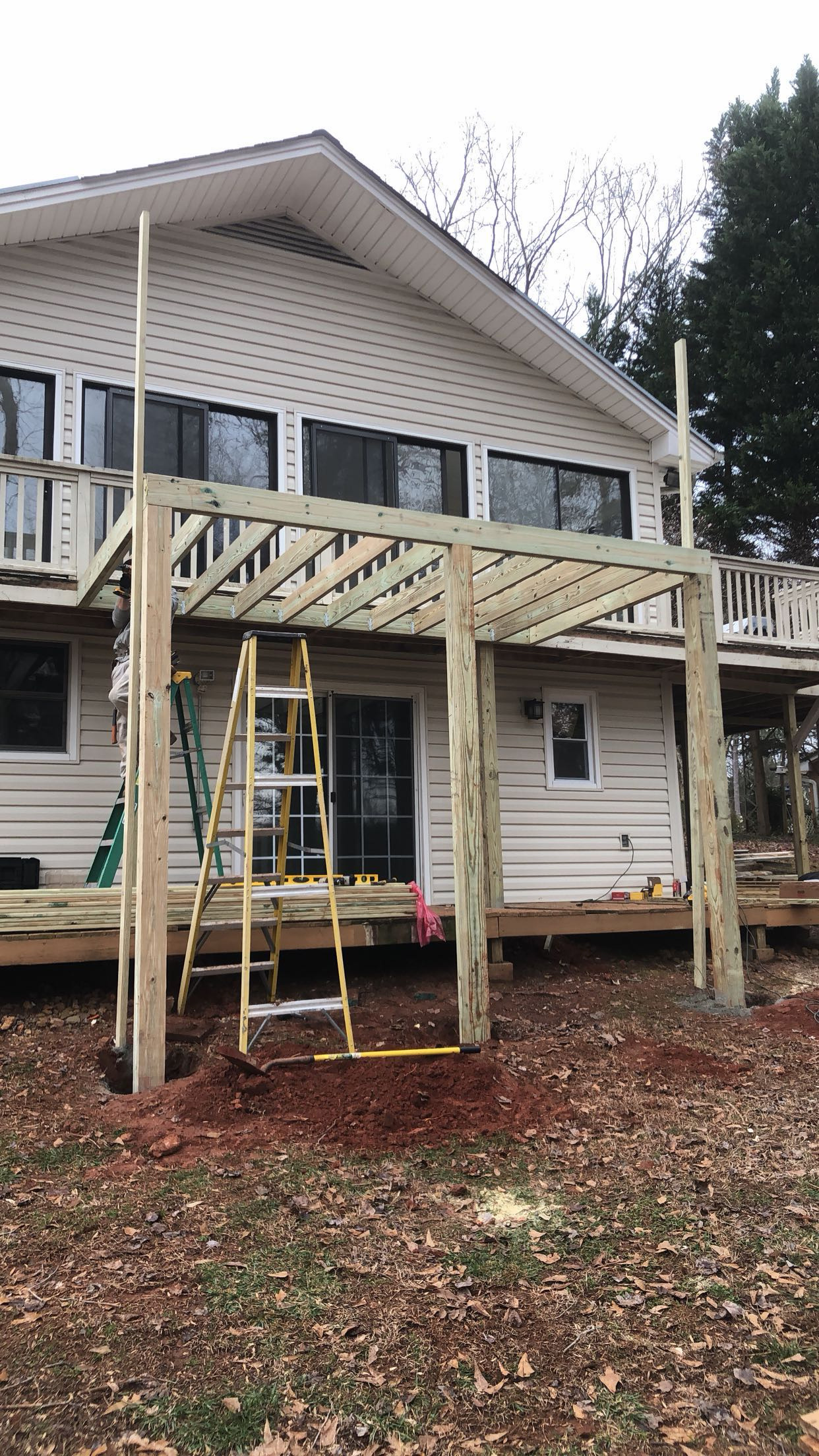 Elevated deck structural joist and post framing by Limitless Construction Services