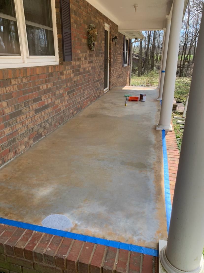Concrete porch during surface preparation and work by Limitless Construction Services