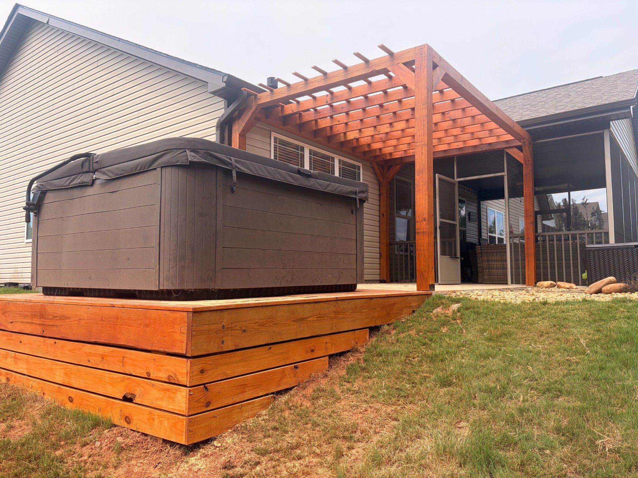 Hot tub deck platform and pergola build by Limitless Construction Services