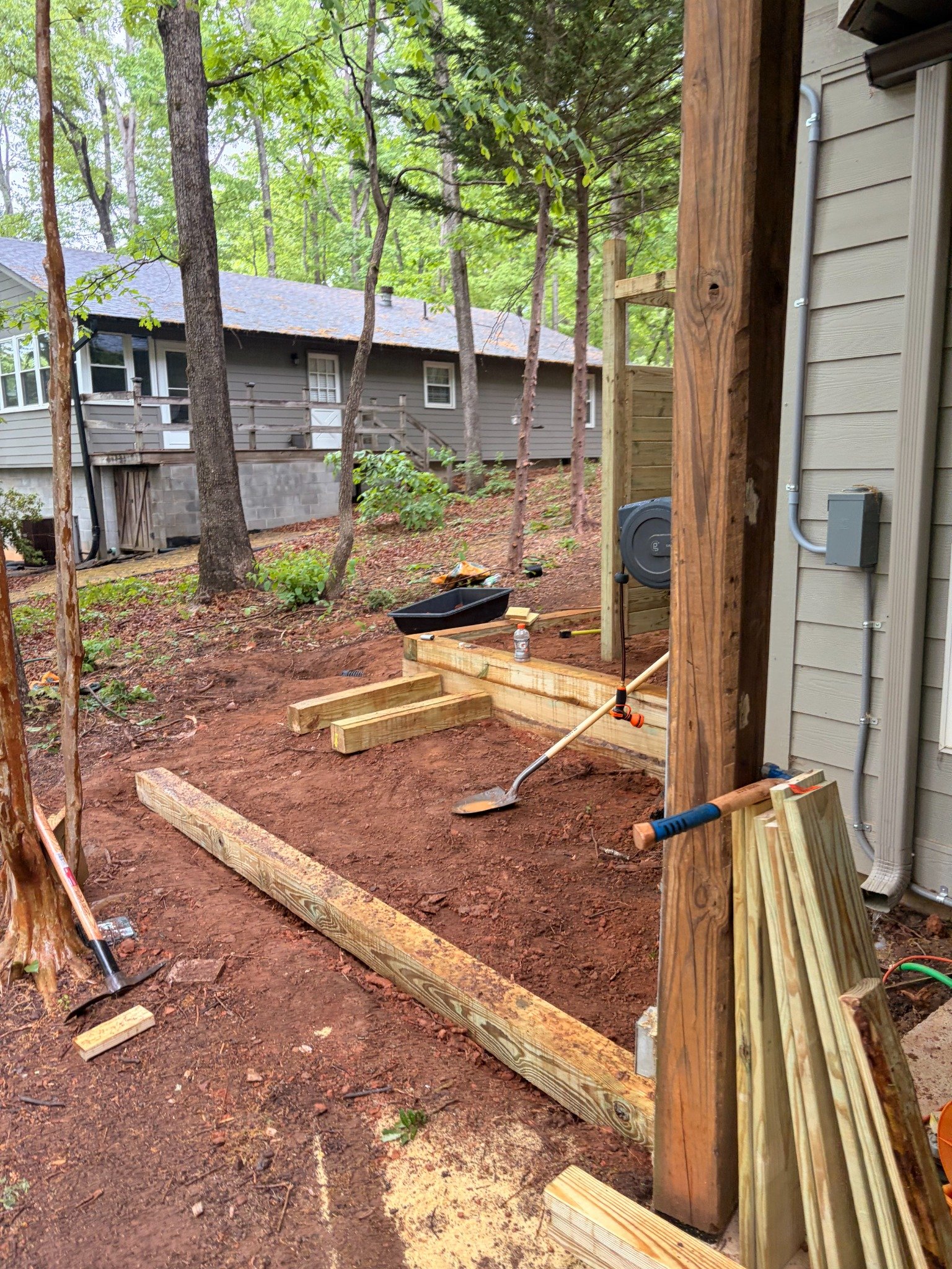 Site preparation and timber framing for outdoor enclosure and landing by Limitless Construction Services