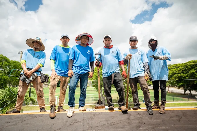 CIT Repair & Remodeling roofing crew standing together on a roof deck project in Fort Lauderdale
