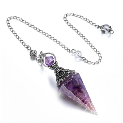 Faceted amethyst crystal pendulum with ornate silver filigree setting and silver chain