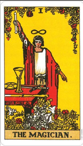 The Magician tarot card (Rider-Waite-Smith) showing a figure in red robes with an infinity symbol above his head, holding a wand toward the heavens and pointing to the earth before a table with the four suit symbols
