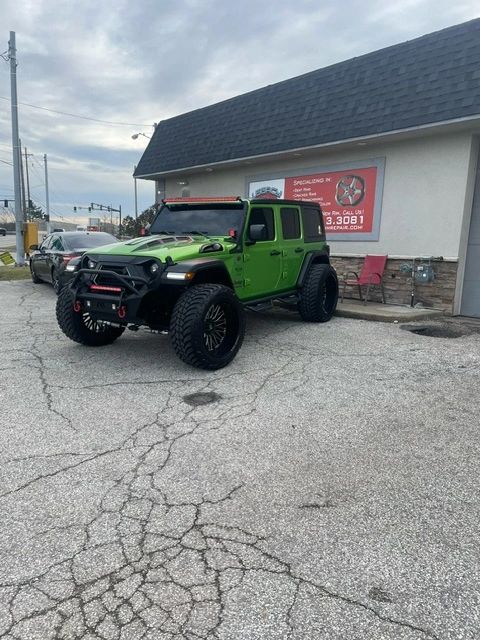 Custom Jeep Wrangler offroad vehicle with custom rims