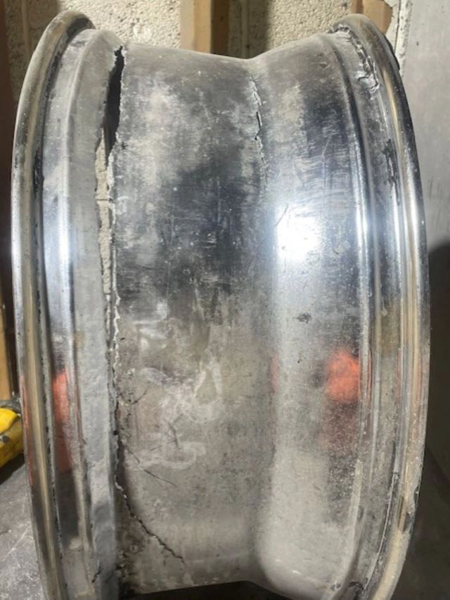Front shop view of Cleveland Rim Repair with customer vehicles