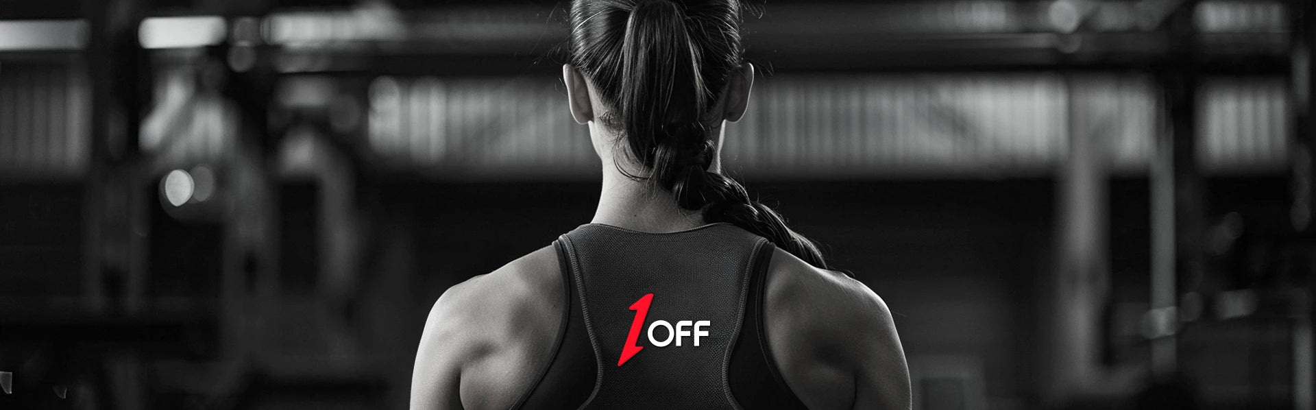 1OFF athlete in athletic gear with athletic back tattoo