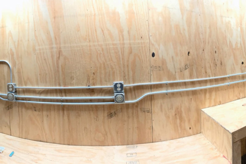 Surface mounted electrical conduit and outlet installation