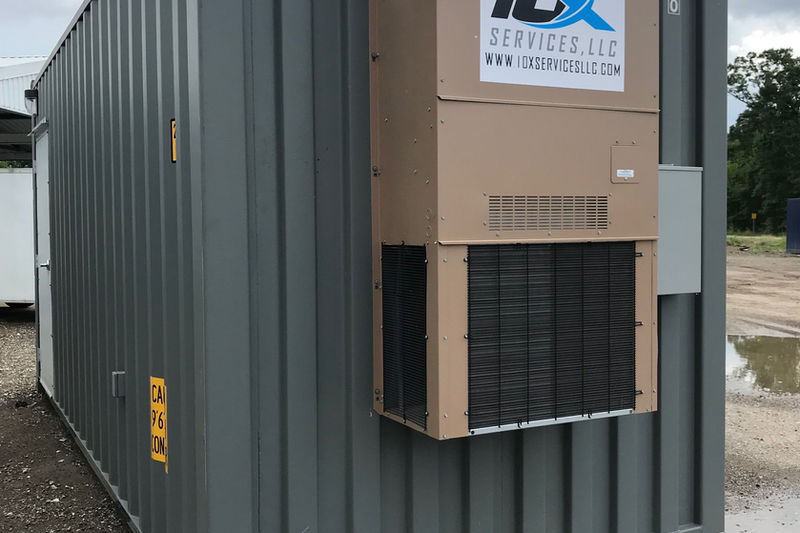 Custom modified storage container with exterior HVAC unit