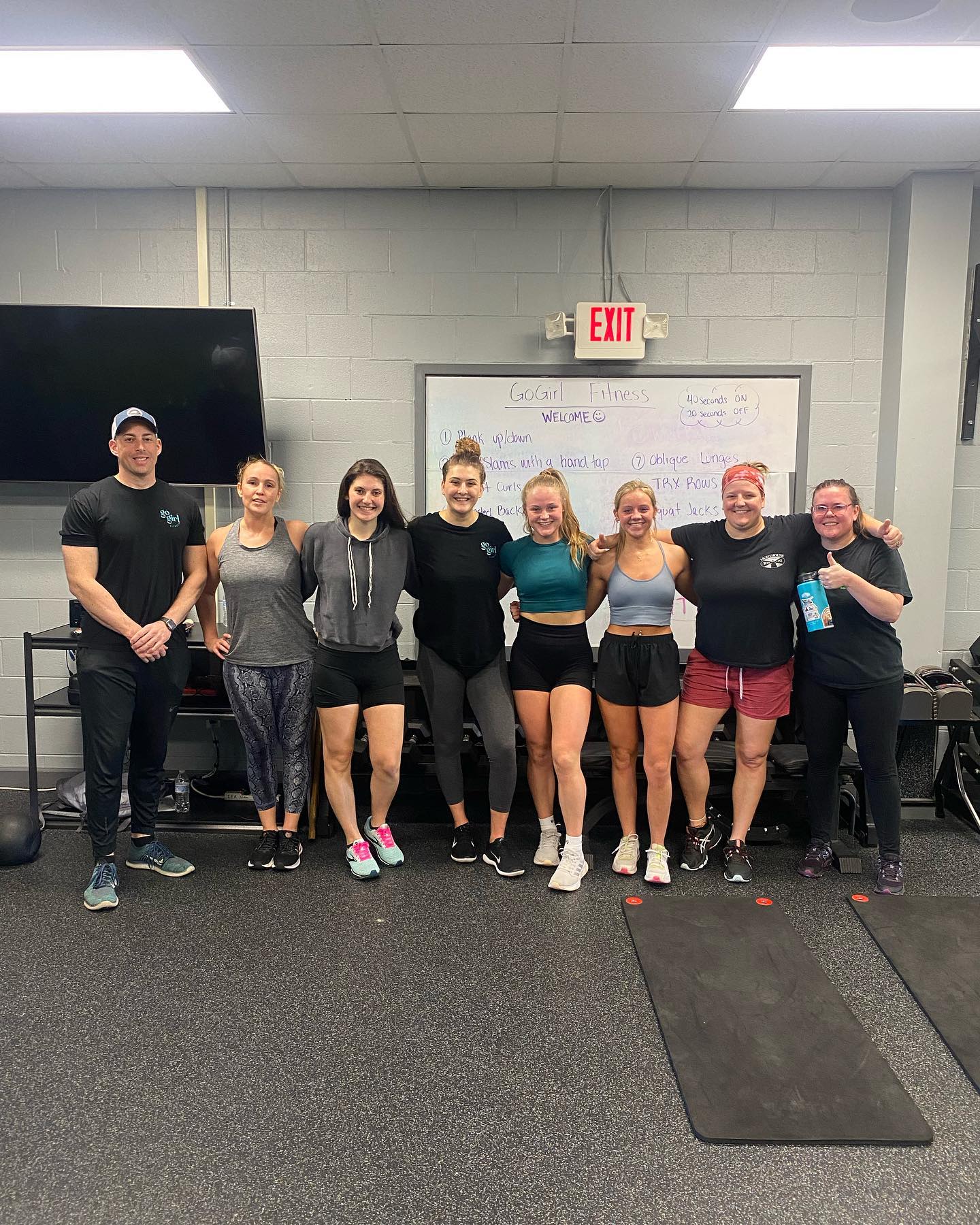 GoGirl Fitness Studio members and trainers together in the studio