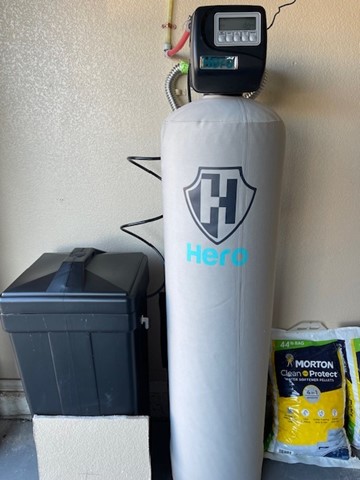 Hero water conditioning system and brine tank installed in a Peoria, AZ garage to protect against hard Valley water