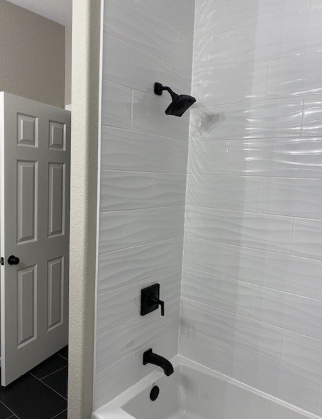 Aurora Plumbing technician installing rough-in plumbing for a full kitchen and bathroom remodel in a Peoria, AZ home