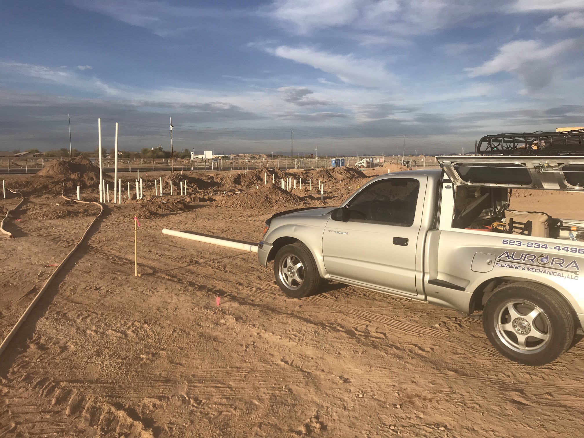 Aurora Plumbing & Mechanical fully stocked service truck parked at a West Valley, AZ home