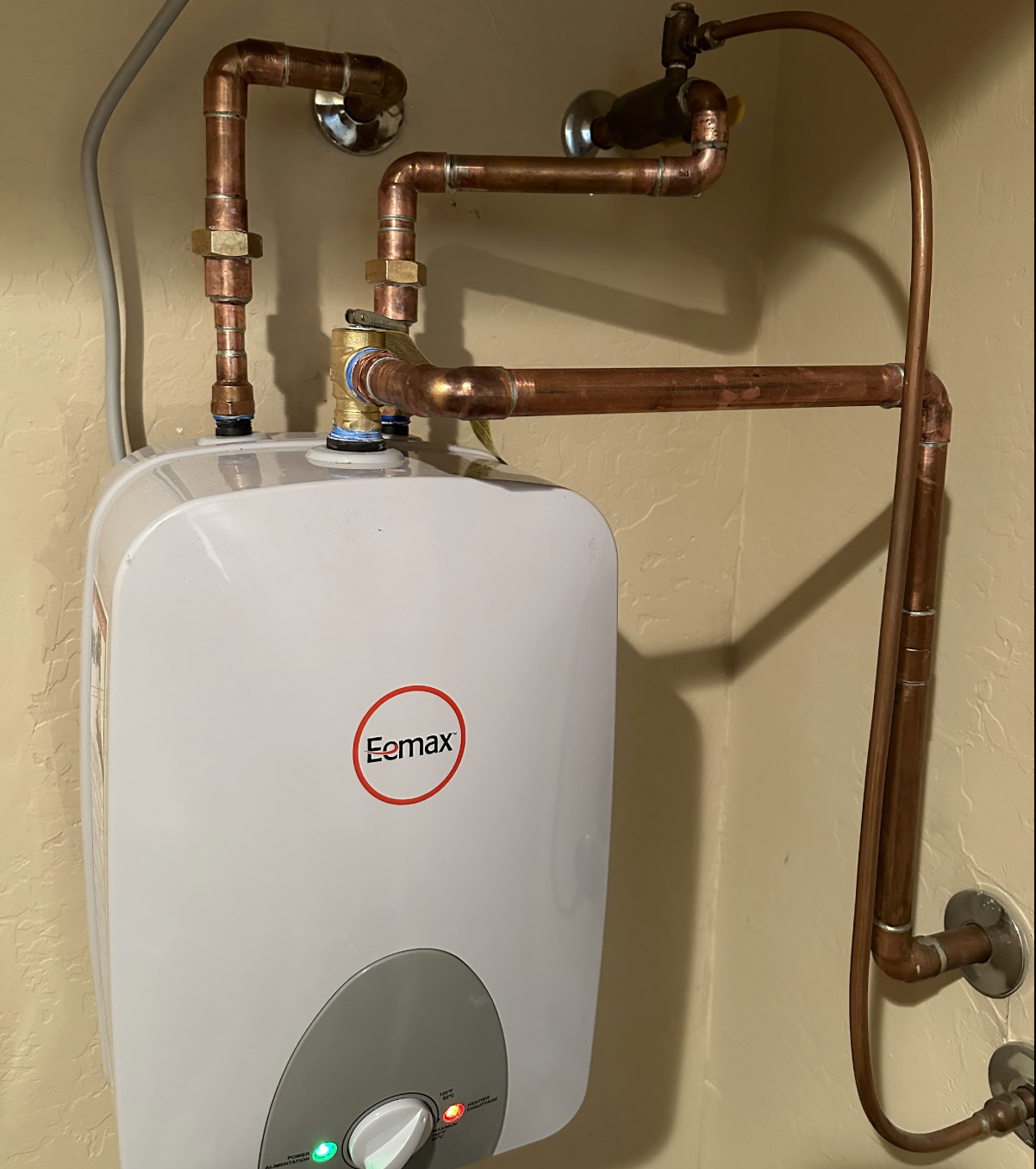 Eemax compact water heater and copper piping installation by Aurora Plumbing in Surprise, AZ
