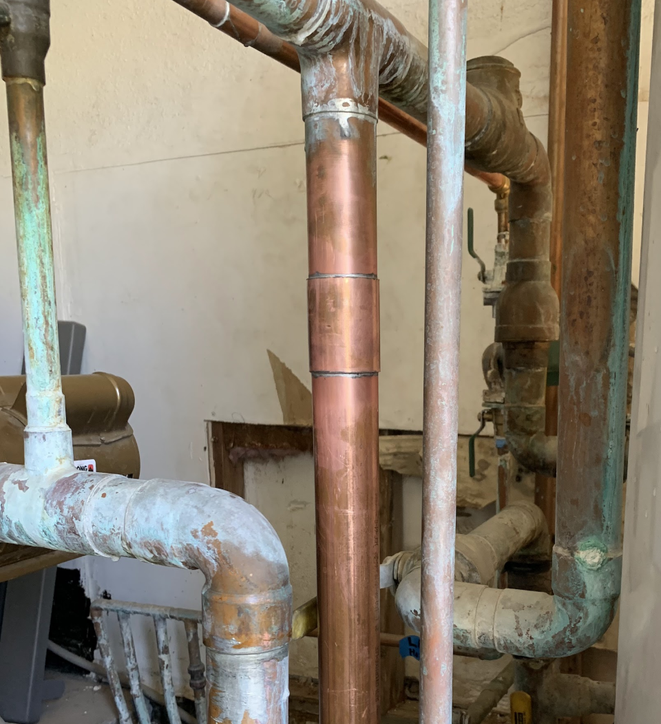 Copper piping replacement and repair installation by Aurora Plumbing