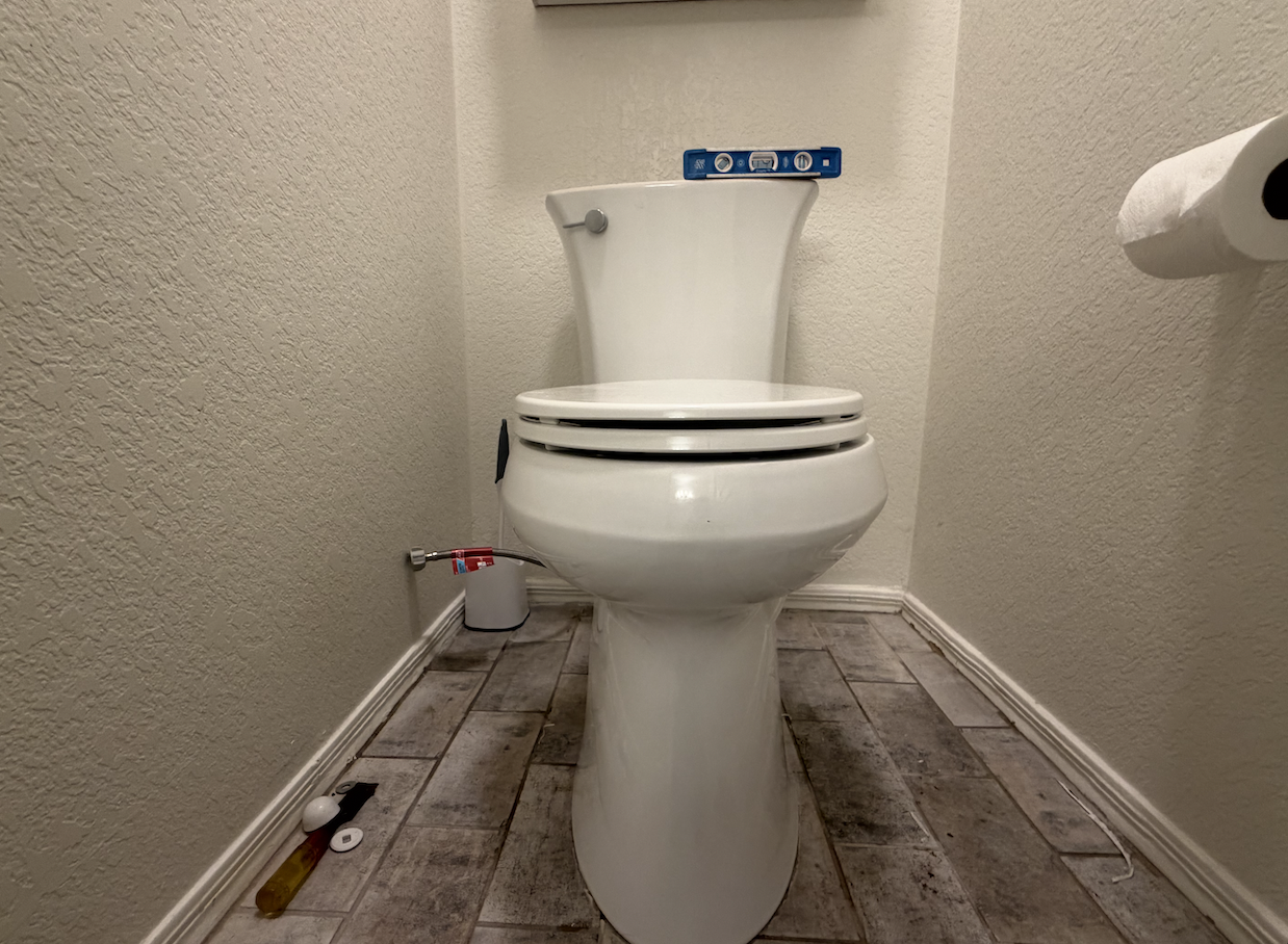 Clean new toilet installed in a bright bathroom in Surprise, AZ