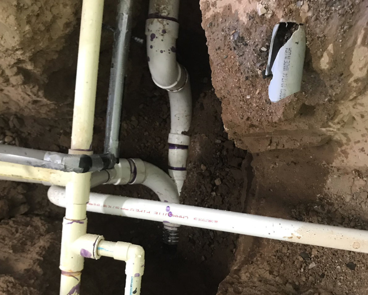 Underground water line excavation and piping repair by Aurora Plumbing in Peoria, AZ