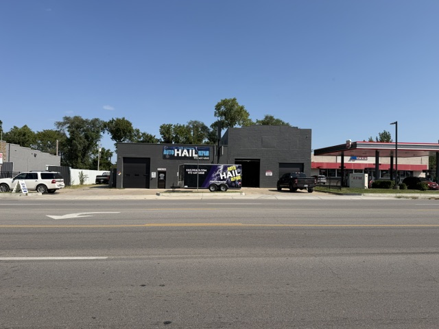 Auto body repair work in progress at Hail Deals shop