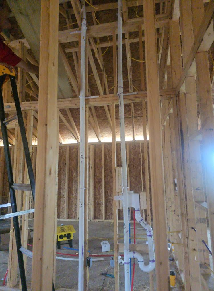 S&K professional PVC rough-in drainage piping installation in new framing