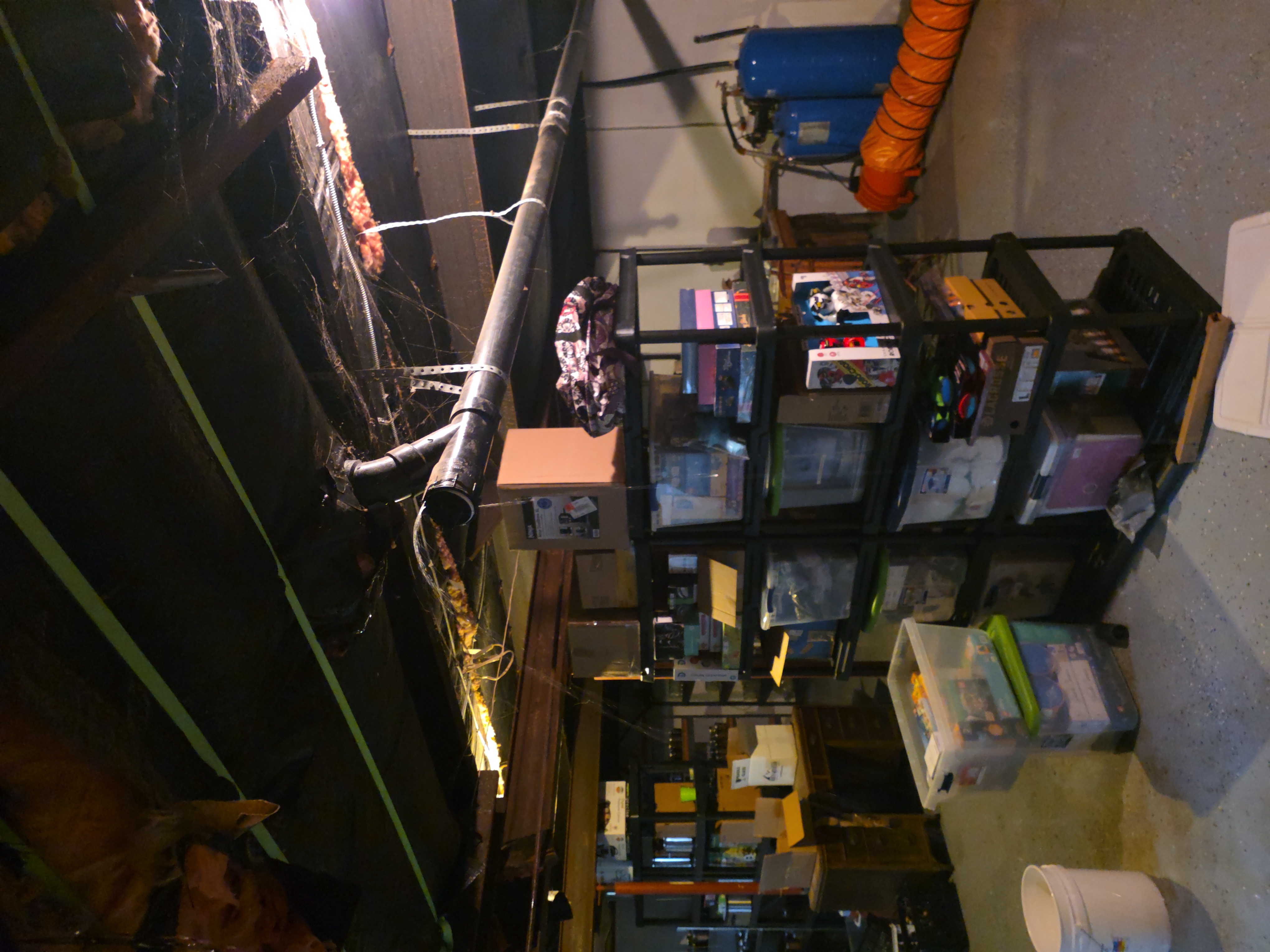 Overhead basement drain line and sanitary branch pipes inspected for leak repair by S&K